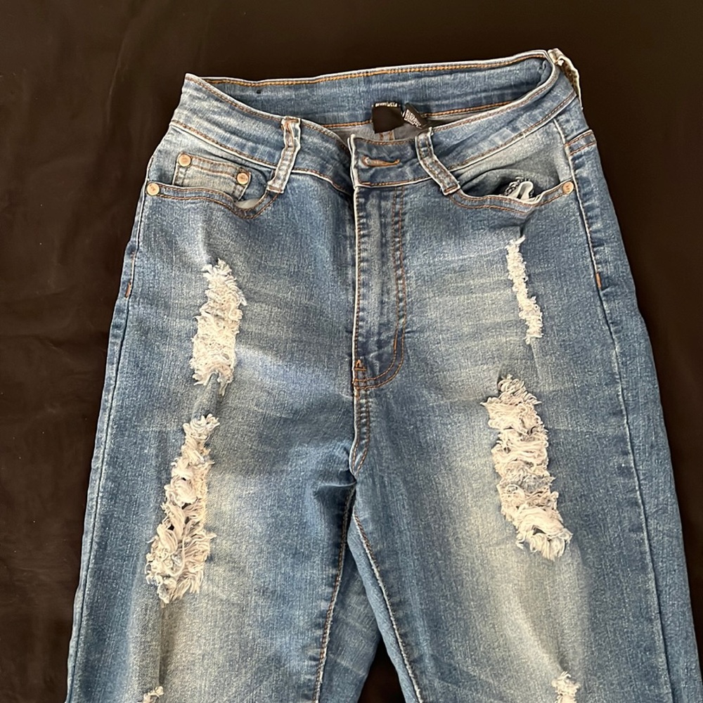 Ripped denim skinny jeans